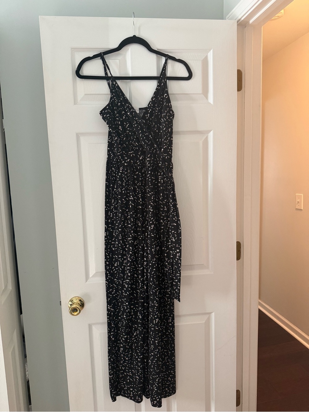 Black jumpsuit with speckle pattern